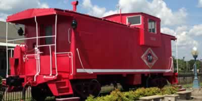 Restored T&P caboose near the depot in Mineola, Texas