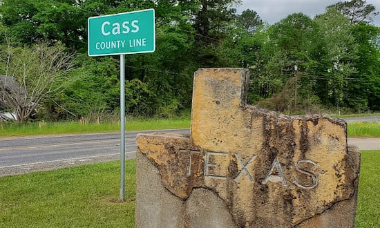 Entering Cass County at the Texas State Line near the Ark-La-Tex Three States Marker