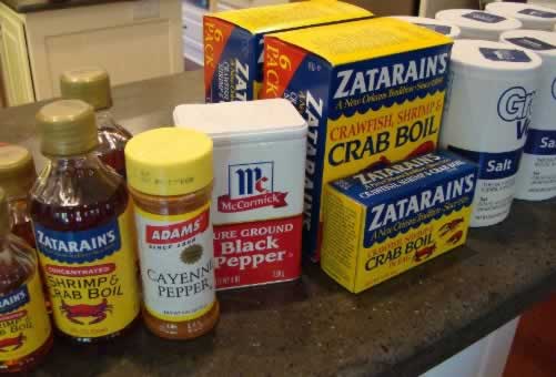 Getting the ingredients ready: shrimp & crab boil, cayenne pepper, black pepper, and salt