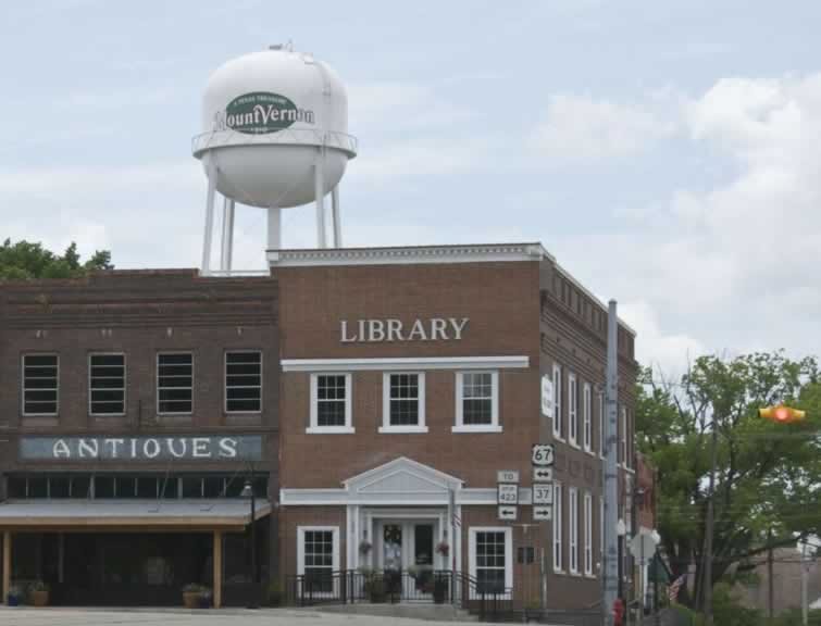 Scene in downtown Mount Vernon, Texas, showing the Library and water tower