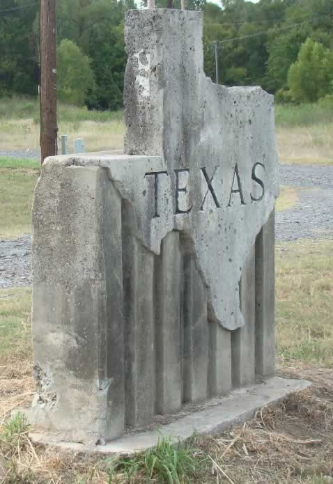 Concrete Texas sign at Louisiana-Texas state line near Waskom